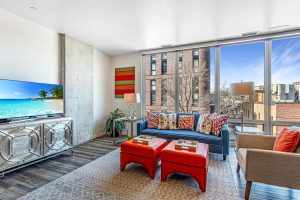 A living room in an apartment building on an upper floor