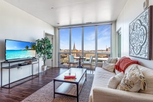 A living room in an apartment building on an upper floor