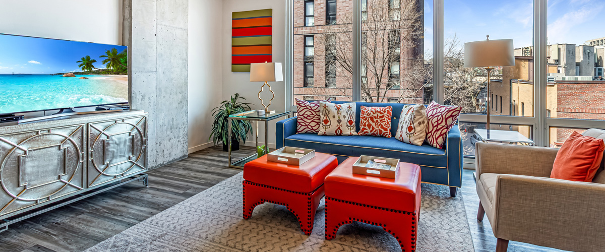 A living room in an apartment building on an upper floor