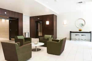 A common area with chairs and a table