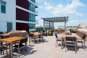 Rooftop Gardens with Grills and Sundeck with tables and chairs